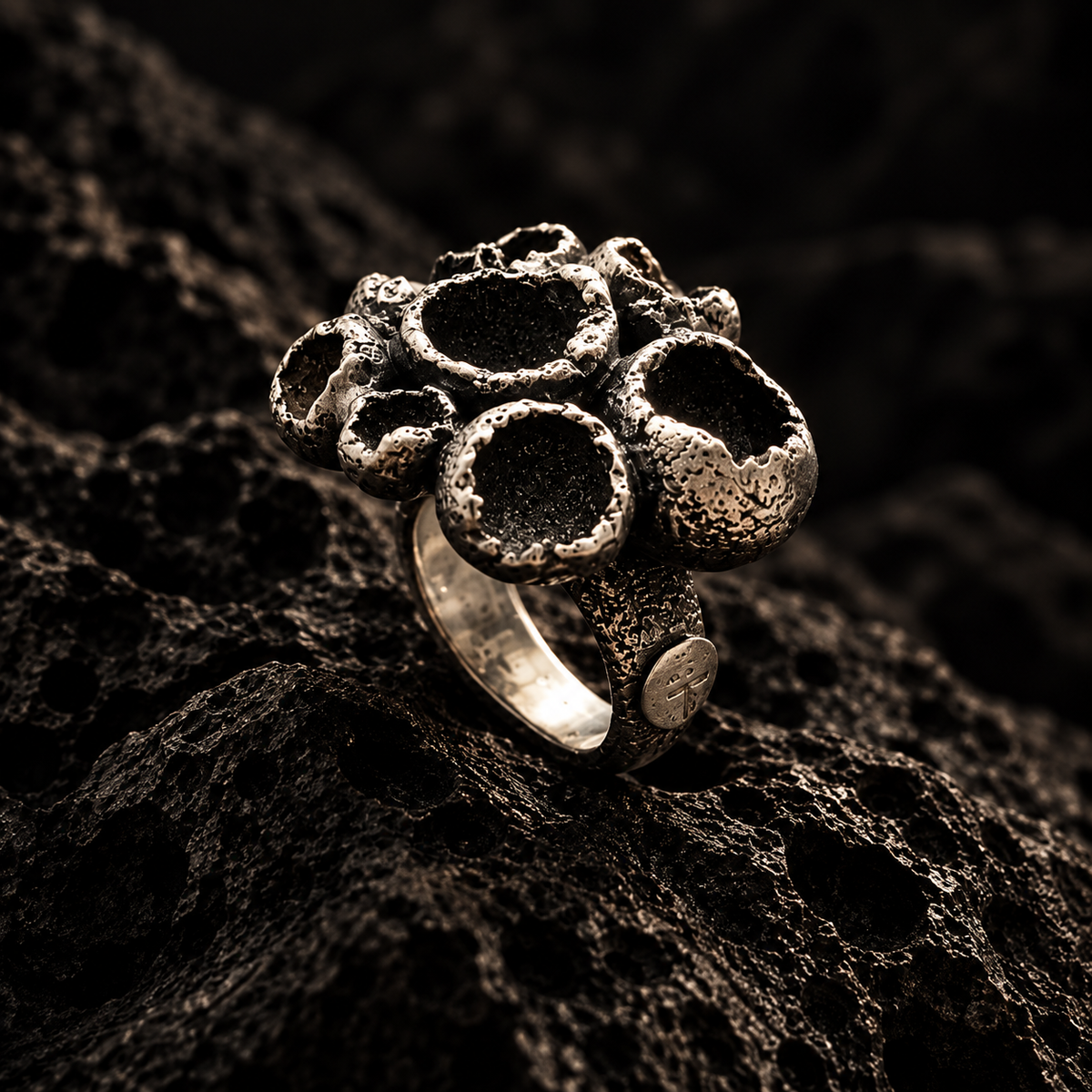 IPKOS sculptural 950 silver ring, three-quarter view
