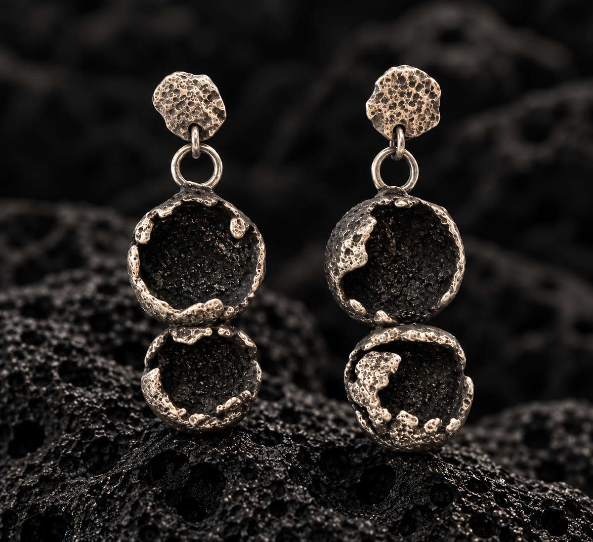 KUENCO sculptural silver earrings, front view